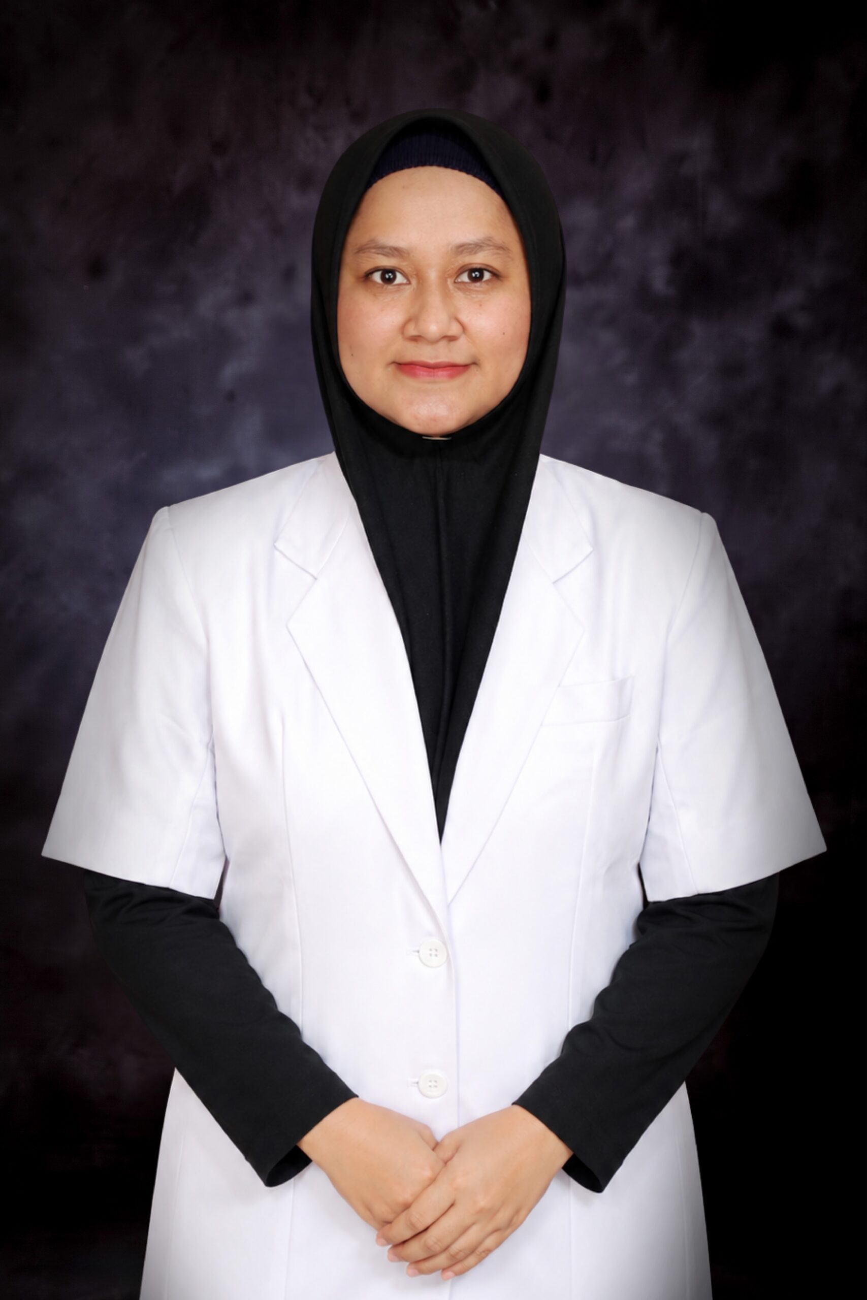 drg. Dewi Monica Ramadhanti, M.KG
