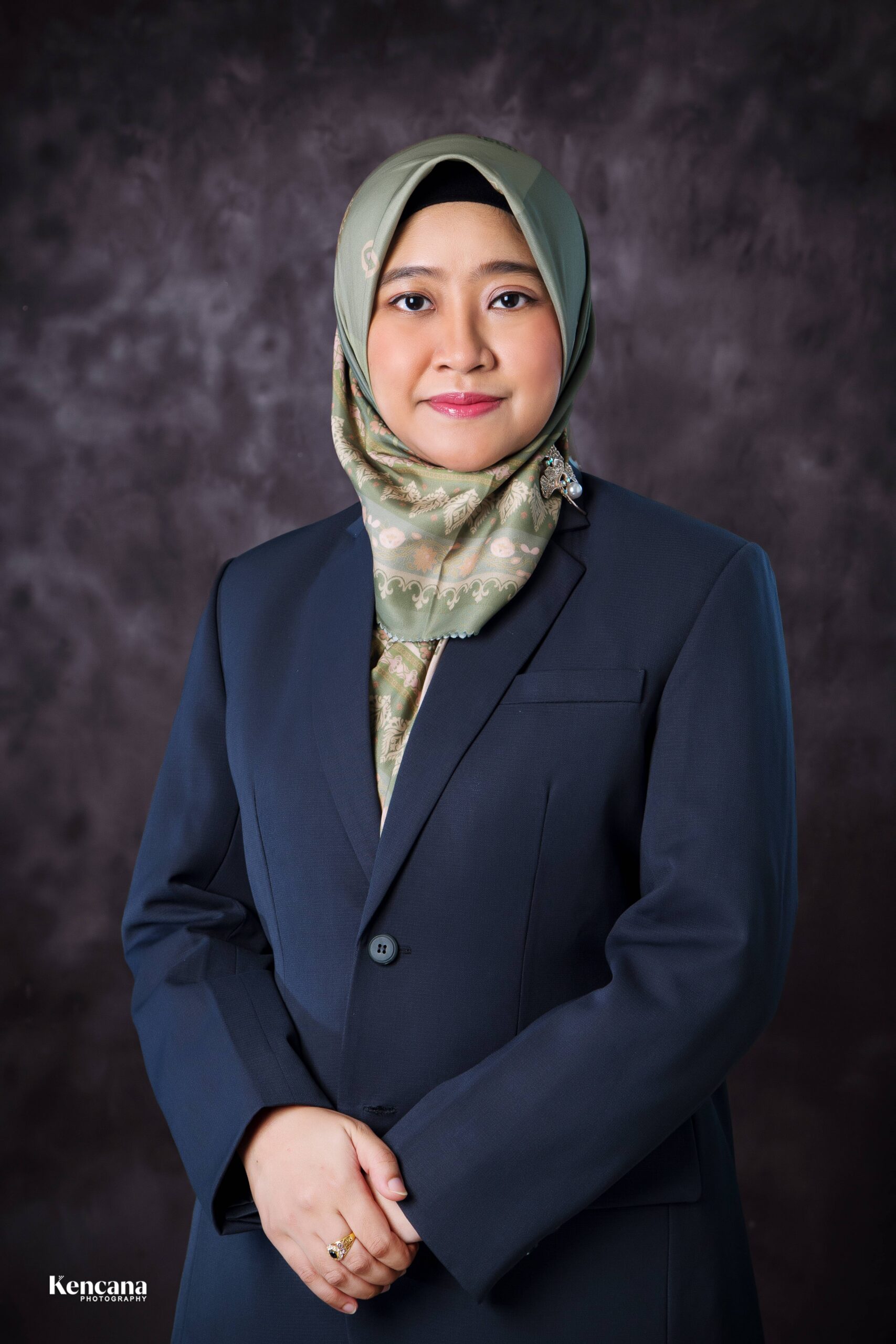 Dr. drg. Rizki Amalina, M.Si